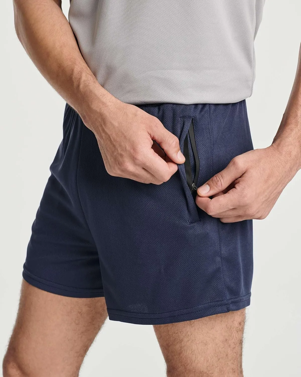 Real Essentials 4 Pack: Men's 3 Inch Mesh Running Short Shorts with Zipper Pockets - Quick Dry Gym Athletic