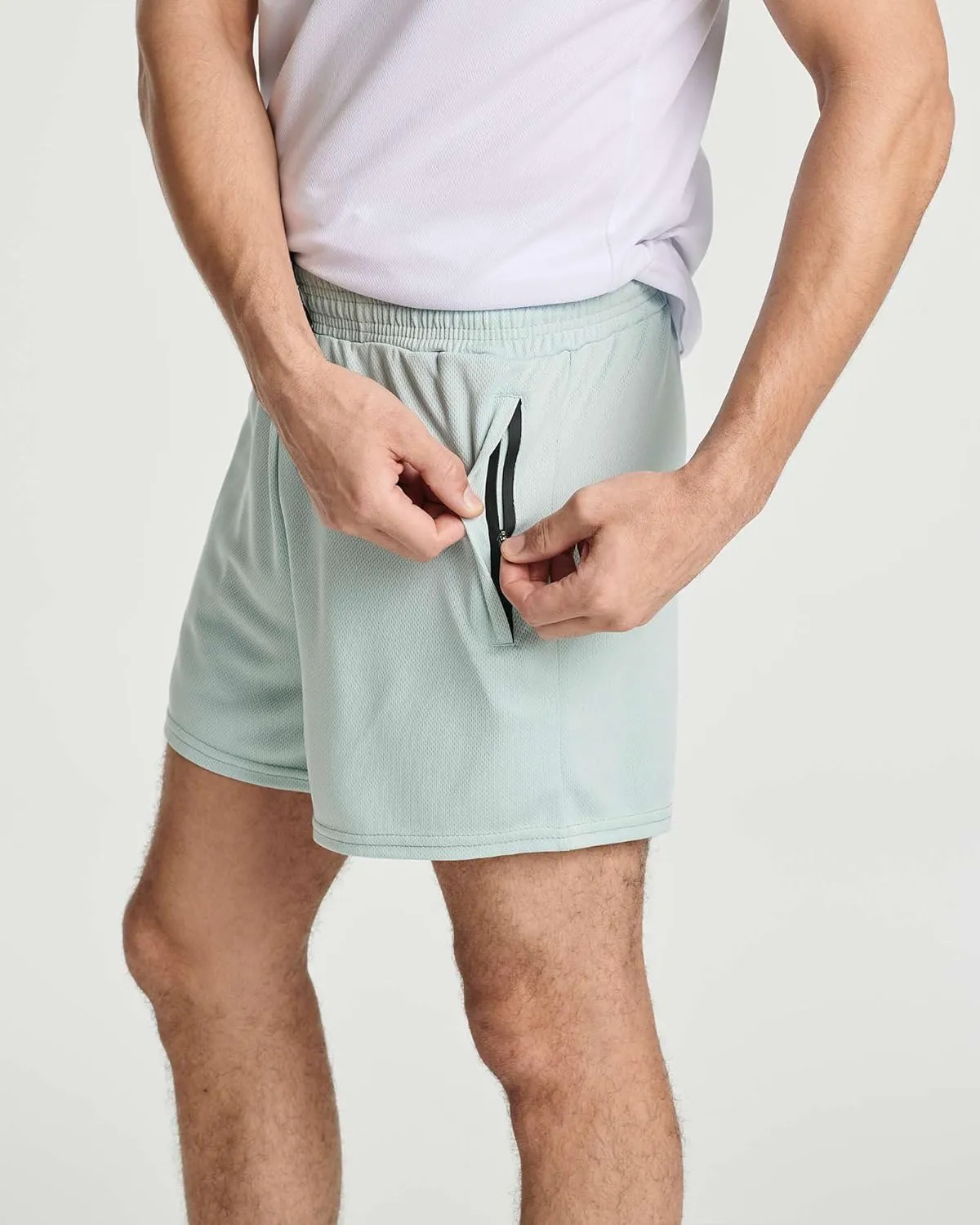 Real Essentials 4 Pack: Men's 3 Inch Mesh Running Short Shorts with Zipper Pockets - Quick Dry Gym Athletic
