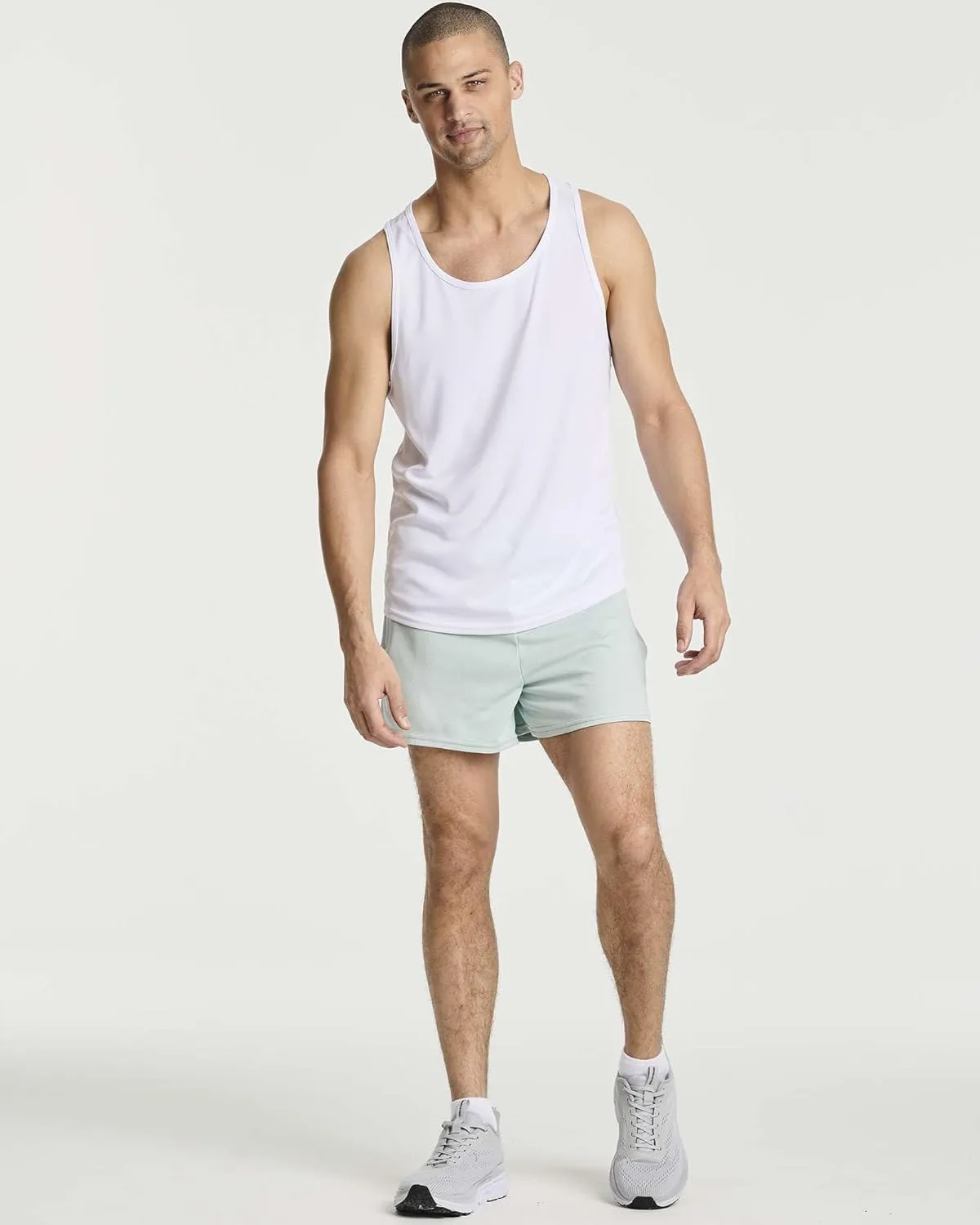 Real Essentials 4 Pack: Men's 3 Inch Mesh Running Short Shorts with Zipper Pockets - Quick Dry Gym Athletic